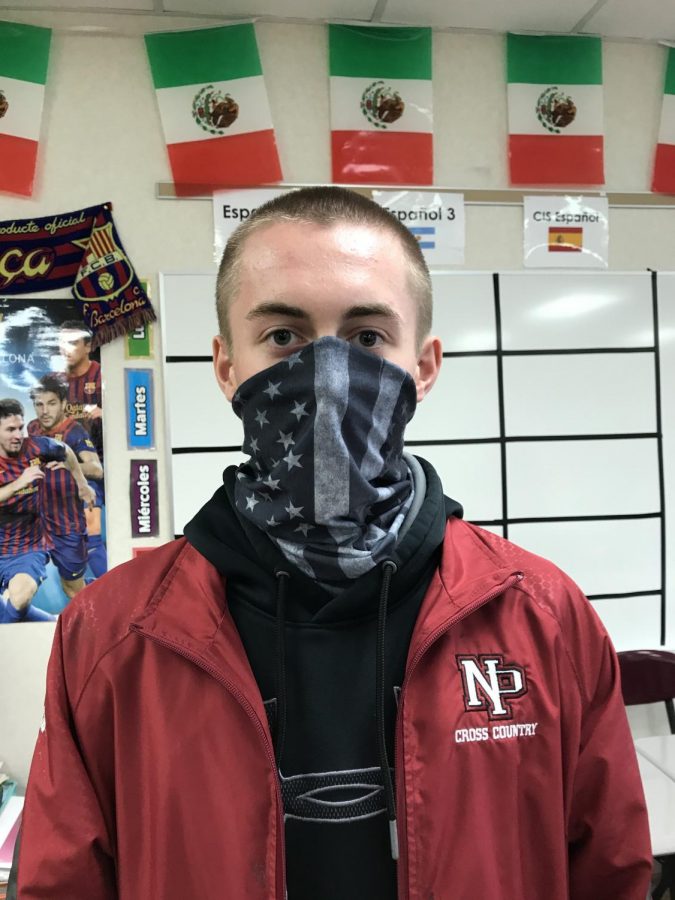 Jacob Helvick models the gaiter - another popular type of face covering.