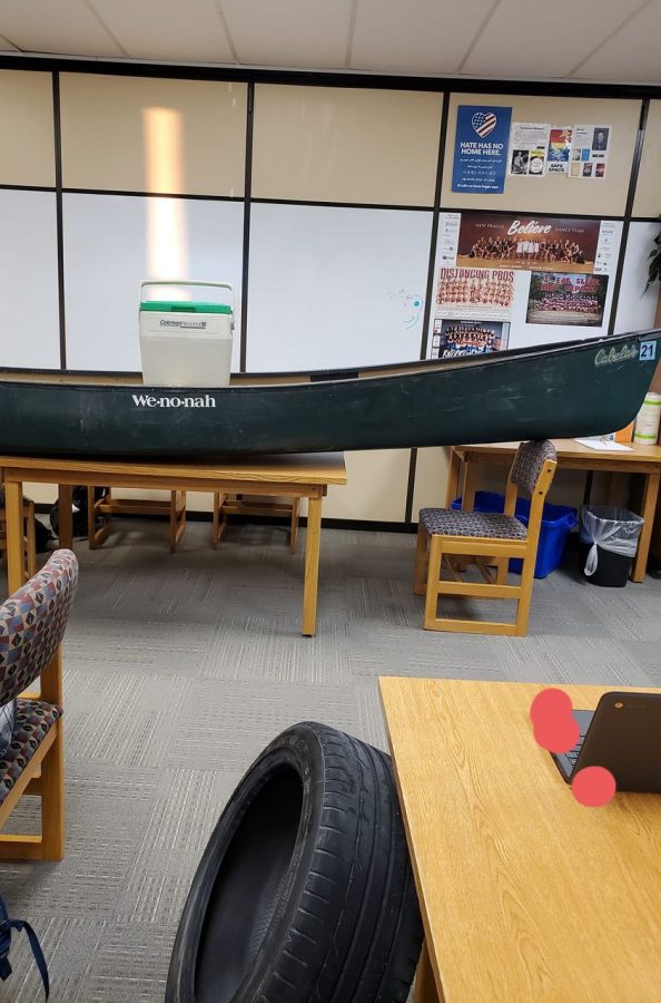 Mr. Lewis had students use a canoe, a tire and a cooler to transport their supplies.